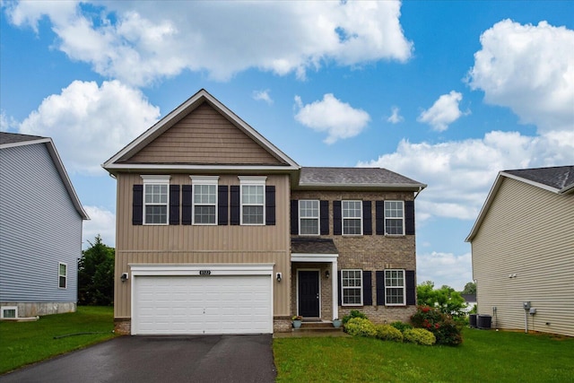 8322 Leighburn Dr, Roanoke, VA 24019 - view of front of property with driveway, a garage, a front lawn, brick siding, and a shingled roof