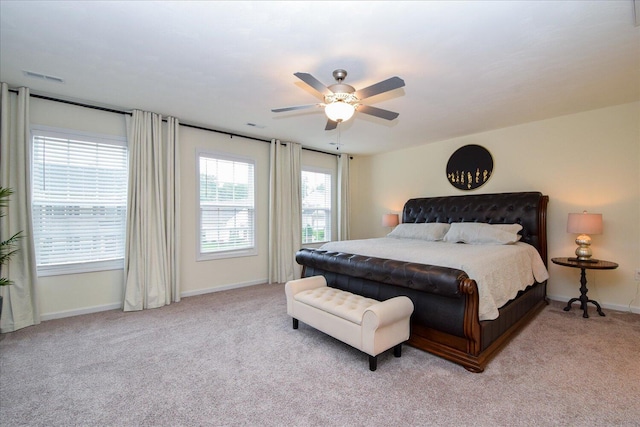 8322 Leighburn Dr, Roanoke, VA 24019 - bedroom with light colored carpet and ceiling fan