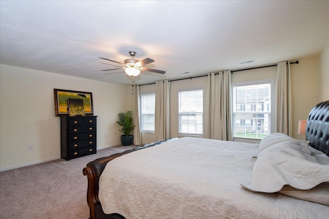8322 Leighburn Dr, Roanoke, VA 24019 - carpeted bedroom featuring baseboards and ceiling fan