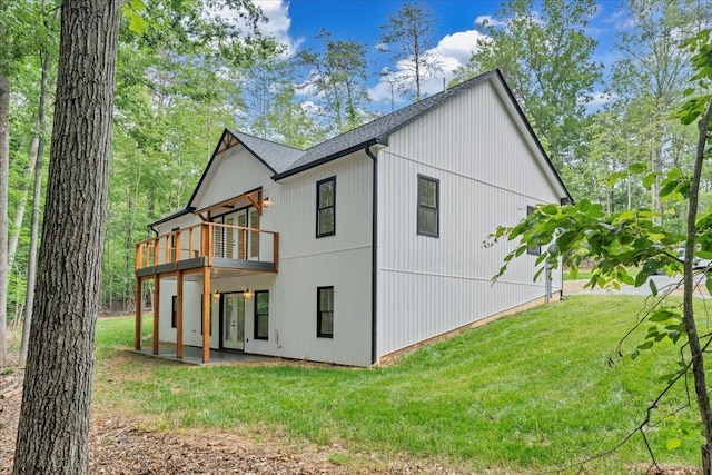 2365 Lakewood Forest Rd, Moneta, VA 24121 - view of side of property featuring a lawn, a patio, and a wooden deck