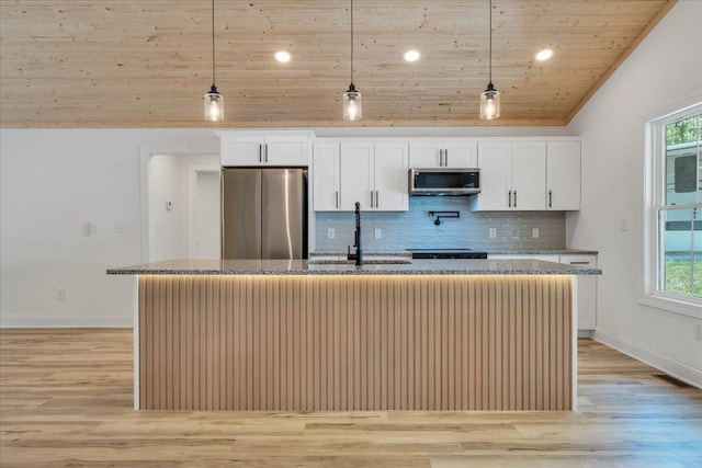 2365 Lakewood Forest Rd, Moneta, VA 24121 - kitchen featuring stainless steel appliances, wooden ceiling, an island with sink, stone countertops, and decorative backsplash