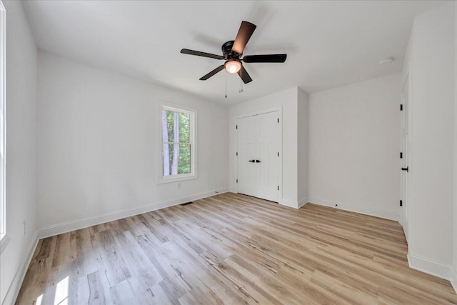 2365 Lakewood Forest Rd, Moneta, VA 24121 - unfurnished bedroom with light wood finished floors and a ceiling fan