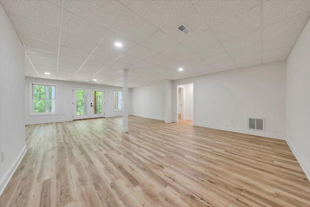 2365 Lakewood Forest Rd, Moneta, VA 24121 - unfurnished room with light wood-type flooring, a paneled ceiling, recessed lighting, and french doors