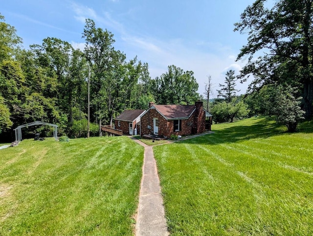 606 Haycock Rd SE, Floyd, VA 24091 - view of front of house with a chimney, a front lawn, and brick siding