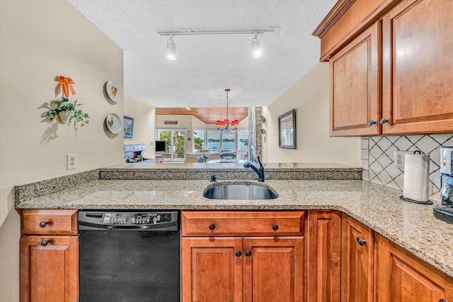 1230 Nature Ln Unit 1, Union Hall, VA 24176 - kitchen with black dishwasher, brown cabinetry, a peninsula, light stone countertops, and a textured ceiling