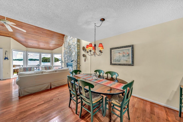 1230 Nature Ln Unit 1, Union Hall, VA 24176 - dining area with lofted ceiling, a chandelier, ceiling fan, hardwood / wood-style flooring, and a textured ceiling
