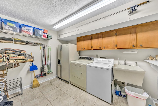 1230 Nature Ln Unit 1, Union Hall, VA 24176 - laundry area featuring cabinet space, independent washer and dryer, a textured ceiling, and light tile patterned floors