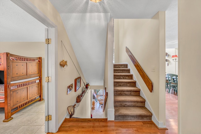 1230 Nature Ln Unit 1, Union Hall, VA 24176 - stairs with a textured ceiling and tile patterned floors