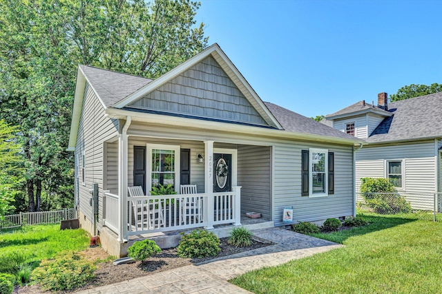 2027 Clinton Ave SE, Roanoke, VA 24013 - bungalow-style house featuring a porch, roof with shingles, and crawl space