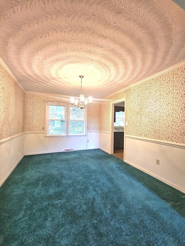 2633 Wood Warbler Ln, Roanoke, VA 24018 - carpeted spare room with wallpapered walls, ornamental molding, wainscoting, a chandelier, and healthy amount of natural light
