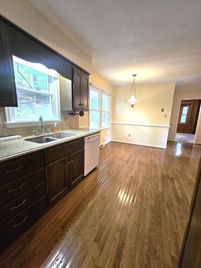 2633 Wood Warbler Ln, Roanoke, VA 24018 - kitchen featuring dishwasher, dark wood-style flooring, light countertops, decorative light fixtures, and dark brown cabinets