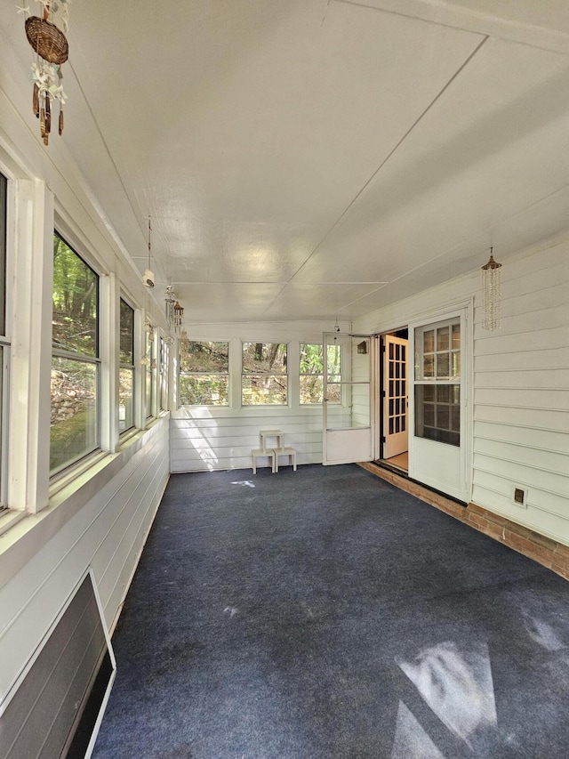 2633 Wood Warbler Ln, Roanoke, VA 24018 - unfurnished sunroom featuring carpet and plenty of natural light