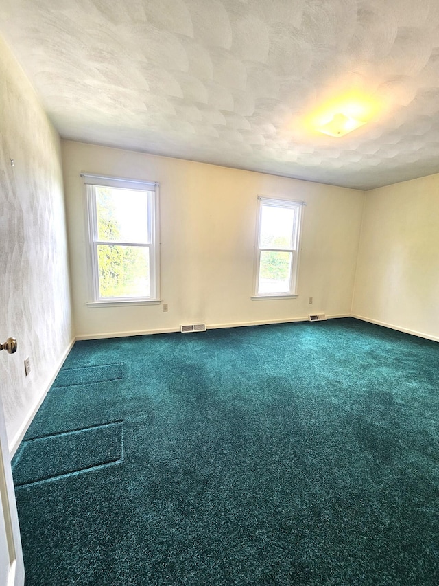 2633 Wood Warbler Ln, Roanoke, VA 24018 - carpeted spare room with baseboards and a textured ceiling
