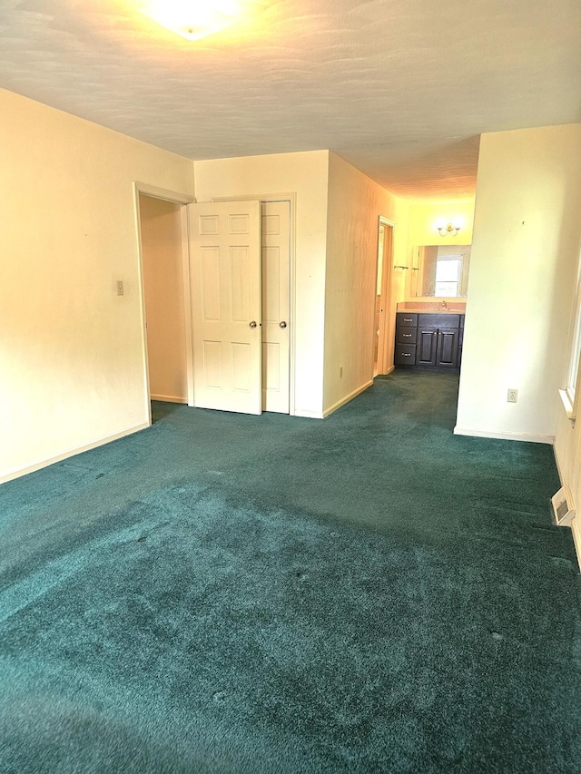 2633 Wood Warbler Ln, Roanoke, VA 24018 - empty room with dark colored carpet and baseboards