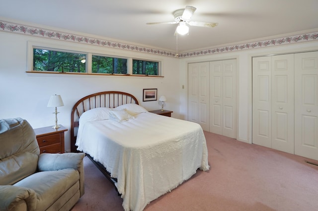 126 Windmere Trl, Moneta, VA 24121 - bedroom featuring multiple closets, light carpet, and a ceiling fan