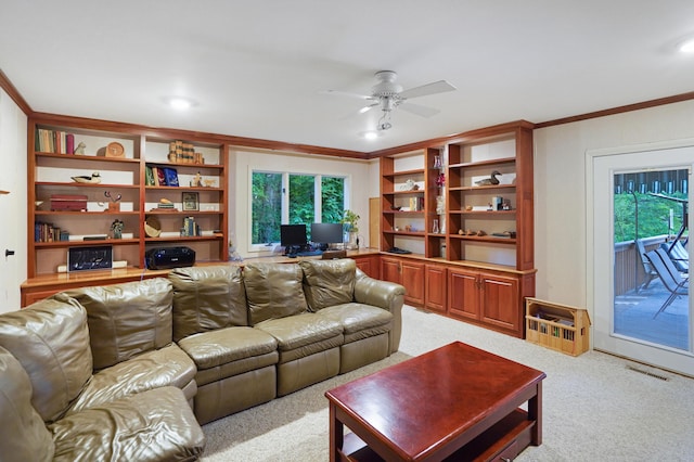 126 Windmere Trl, Moneta, VA 24121 - living room featuring a ceiling fan, a desk, ornamental molding, carpet flooring, and plenty of natural light
