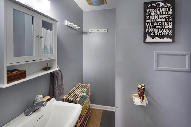 126 Windmere Trl, Moneta, VA 24121 - bathroom featuring a sink and baseboards