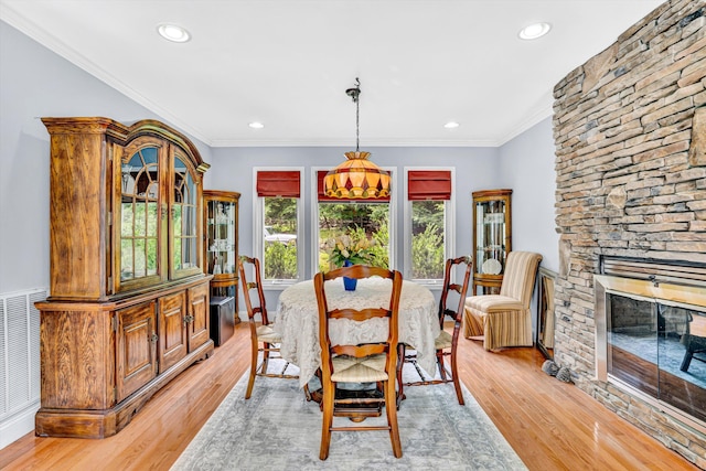 304 Blazing Ridge Dr Unit 0, Pittsville, VA 24139 - dining room featuring a fireplace, light wood-style floors, recessed lighting, and ornamental molding