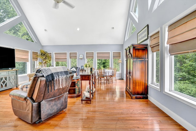 304 Blazing Ridge Dr Unit 0, Pittsville, VA 24139 - living area with high vaulted ceiling, a ceiling fan, and light wood-type flooring