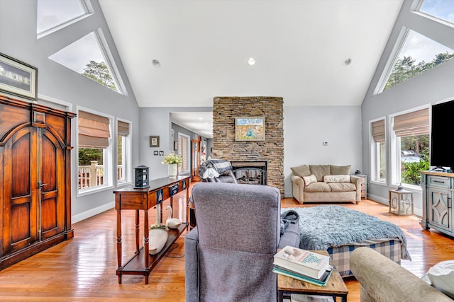 304 Blazing Ridge Dr Unit 0, Pittsville, VA 24139 - living area with high vaulted ceiling, light wood-type flooring, and a stone fireplace