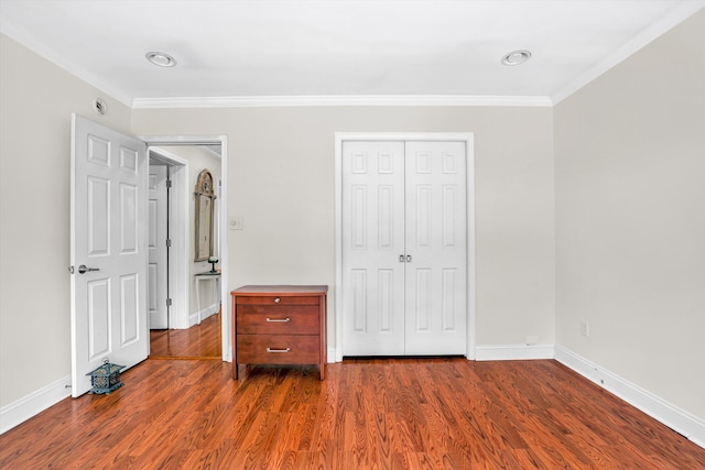 304 Blazing Ridge Dr Unit 0, Pittsville, VA 24139 - unfurnished bedroom with crown molding, dark wood-type flooring, and a closet