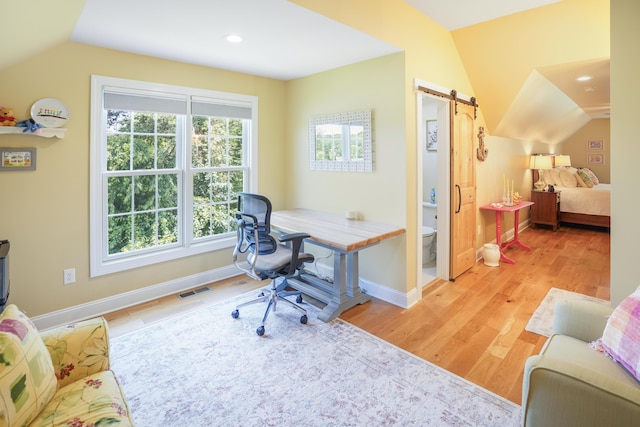 414 Augusta Way, Wirtz, VA 24184 - office area featuring a barn door, vaulted ceiling, plenty of natural light, light wood-style floors, and recessed lighting