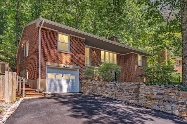 2702 Yellow Mountain Rd SE, Roanoke, VA 24014 - single story home featuring driveway, brick siding, and a garage