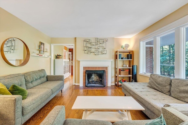 2702 Yellow Mountain Rd SE, Roanoke, VA 24014 - living room with wood finished floors and a fireplace