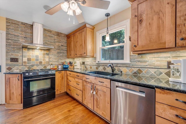 2702 Yellow Mountain Rd SE, Roanoke, VA 24014 - kitchen featuring stainless steel dishwasher, black gas stove, wall chimney exhaust hood, a ceiling fan, and decorative backsplash