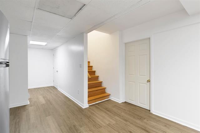 3325 Fleetwood Ave SW, Roanoke, VA 24015 - finished below grade area featuring wood finished floors and stairway