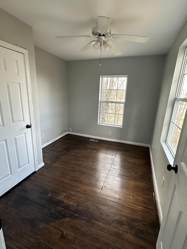 120 10 1/2 St SE, Roanoke, VA 24013 - spare room featuring ceiling fan and dark wood-style floors