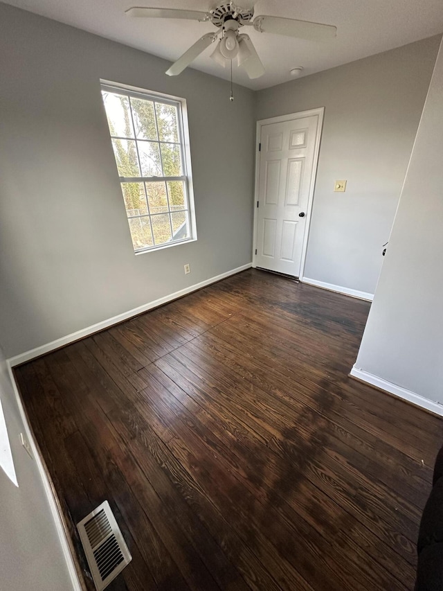 120 10 1/2 St SE, Roanoke, VA 24013 - empty room featuring a ceiling fan and dark wood finished floors
