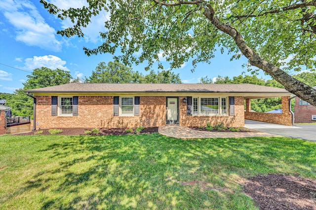 716 Arcadia Cir, Vinton, VA 24179 - ranch-style home featuring driveway, brick siding, an attached carport, and a front lawn