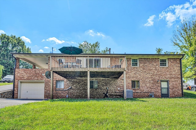 716 Arcadia Cir, Vinton, VA 24179 - view of front of property with a front lawn, an attached garage, asphalt driveway, a wooden deck, and brick siding