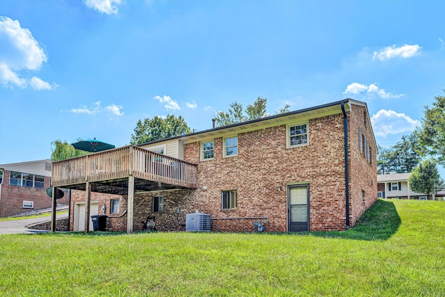 716 Arcadia Cir, Vinton, VA 24179 - back of property featuring a yard, a deck, and brick siding