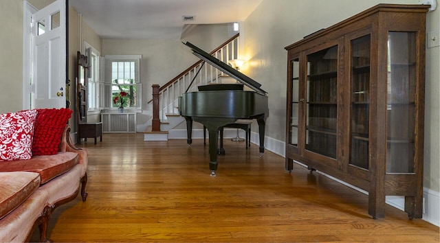2506 Rosalind Ave SW, Roanoke, VA 24014 - sitting room with wood finished floors and stairs