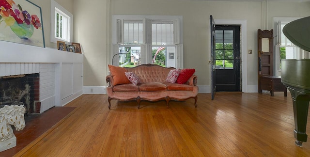 2506 Rosalind Ave SW, Roanoke, VA 24014 - living room with wood finished floors and a fireplace