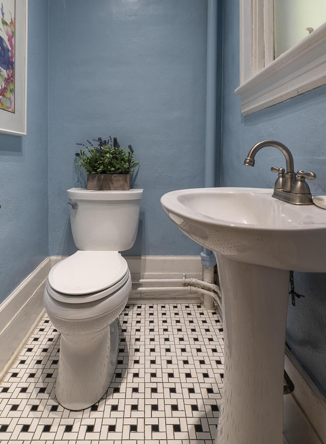 2506 Rosalind Ave SW, Roanoke, VA 24014 - half bathroom featuring toilet and baseboards