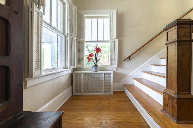 2506 Rosalind Ave SW, Roanoke, VA 24014 - stairway featuring radiator and wood finished floors