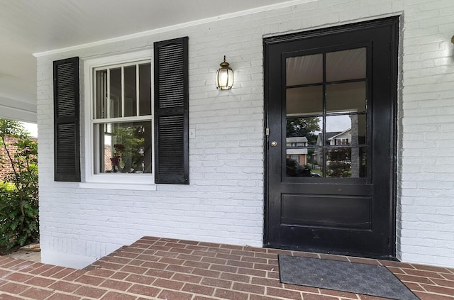 2506 Rosalind Ave SW, Roanoke, VA 24014 - view of exterior entry featuring brick siding and covered porch