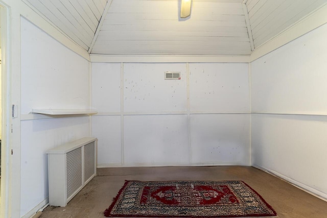 2506 Rosalind Ave SW, Roanoke, VA 24014 - unfurnished room featuring concrete floors, radiator, vaulted ceiling, and wooden ceiling