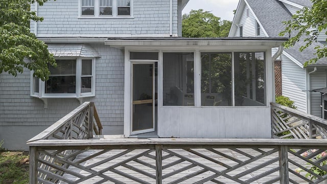 2506 Rosalind Ave SW, Roanoke, VA 24014 - wooden deck with a sunroom