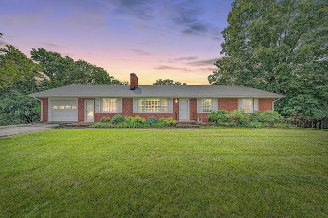 4362 Fontaine Cir, Roanoke, VA 24018 - ranch-style home featuring an attached garage, asphalt driveway, a chimney, and brick siding