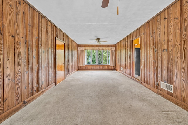 4362 Fontaine Cir, Roanoke, VA 24018 - empty room featuring ceiling fan, carpet, and wood walls