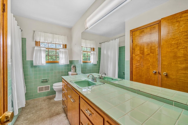 4362 Fontaine Cir, Roanoke, VA 24018 - bathroom featuring tile walls, vanity, wainscoting, and a shower with curtain