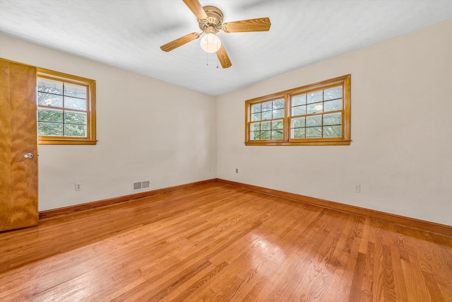 4362 Fontaine Cir, Roanoke, VA 24018 - unfurnished room with plenty of natural light, light wood-style floors, and ceiling fan