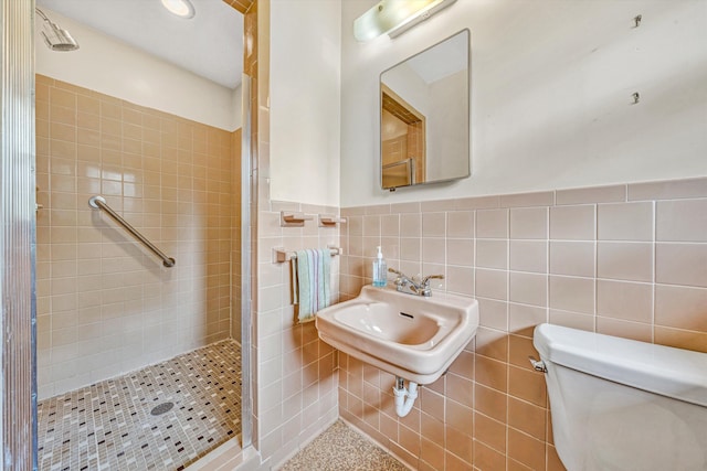 4362 Fontaine Cir, Roanoke, VA 24018 - bathroom featuring a shower stall, tile walls, and a wainscoted wall