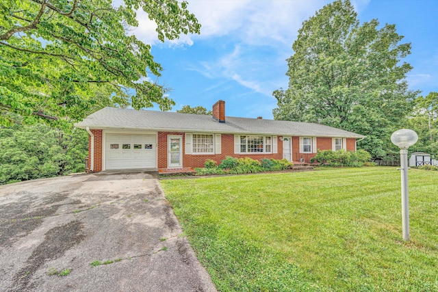 4362 Fontaine Cir, Roanoke, VA 24018 - ranch-style house featuring an attached garage, concrete driveway, a chimney, brick siding, and a front lawn