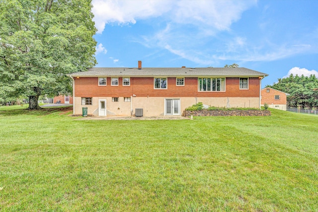 4362 Fontaine Cir, Roanoke, VA 24018 - rear view of property featuring a lawn, brick siding, and a chimney