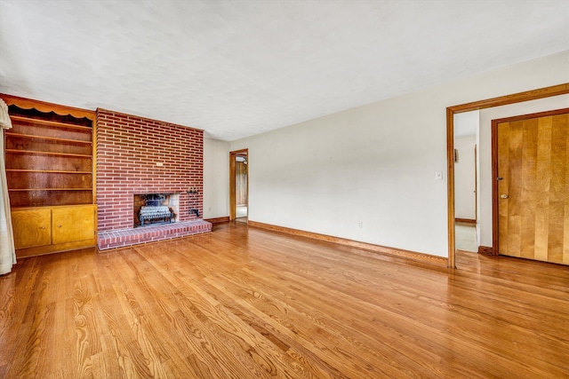 4362 Fontaine Cir, Roanoke, VA 24018 - unfurnished living room featuring wood finished floors and a brick fireplace